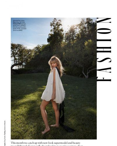 Miranda Kerr in stylish floral dress with radiant blond hair