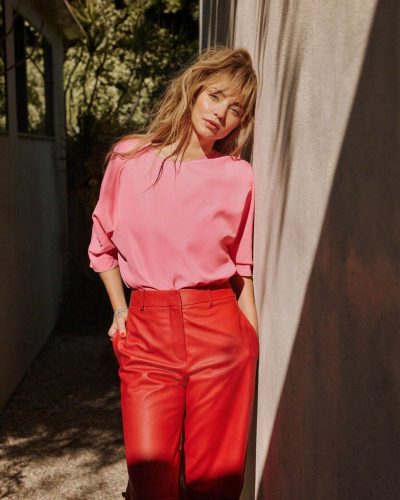 Miranda Kerr in flowy white dress with floral details