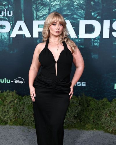 Miranda Morris floor-length black dress with soft flowing fabric