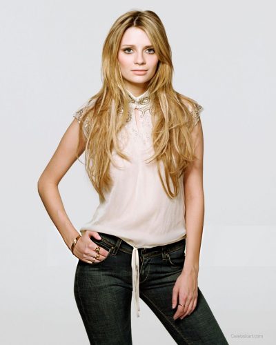 Mischa Barton colorful jumpsuit with fitted style and playful patterns.