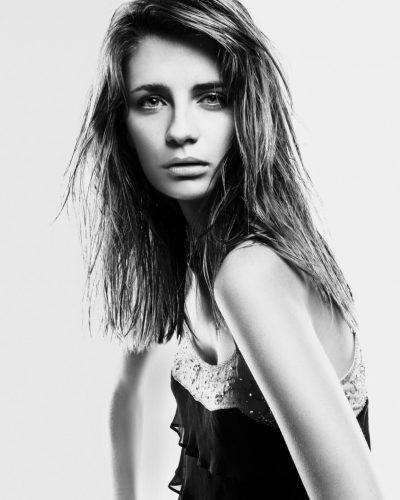 Mischa Barton black top featuring intricate embellishments