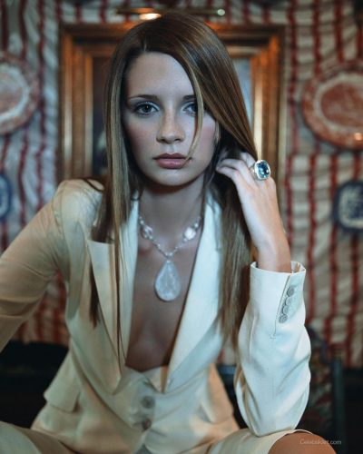 Mischa Barton in white suit jacket and chic high-waisted shorts