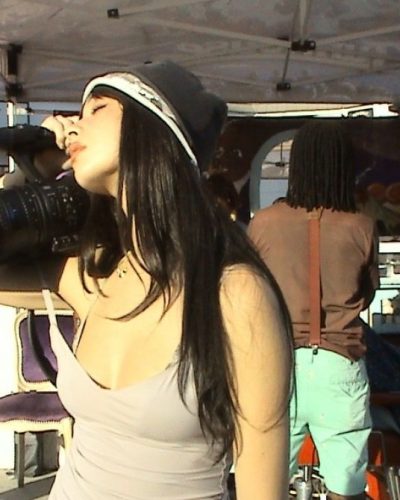 Mishka Silva in contemporary light-colored jumpsuit