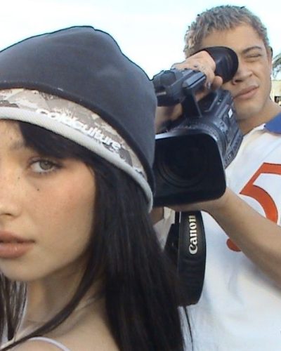 Mishka Silva wearing sleek body suit with graphic black hat