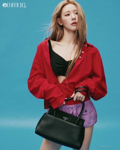 Miyeon in casual red sweatshirt and stylish lilac shorts