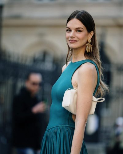 Nadine Leopold graceful movements in emerald green dress