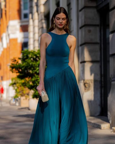 Nadine Leopold fashionable emerald green dress with graceful lines