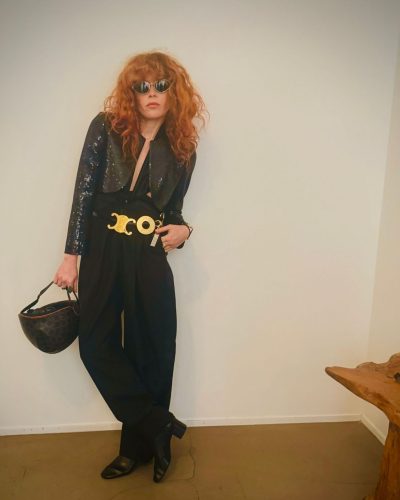 Natasha Lyonne black sequined pantsuit with fitted jacket