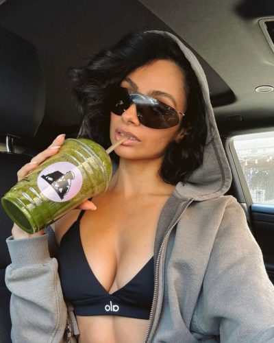Nazanin Mandi in black sports bra with matching black leggings