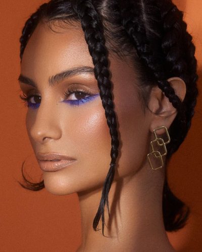 Nazanin Mandi in fashionable orange bikini with flattering shape.