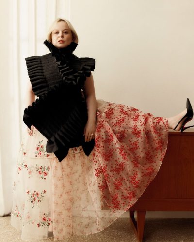 Nicola Coughlan black ensemble with textured fabric and bow