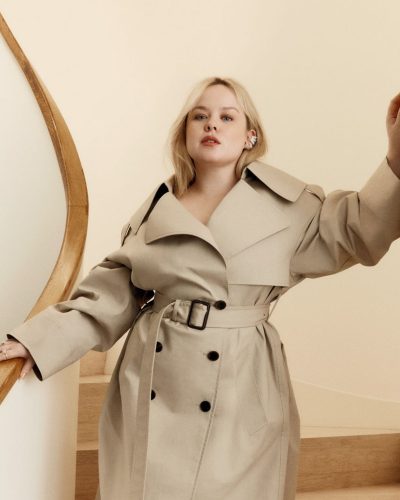 Nicola Coughlan black blouse with striking white bow embellishment