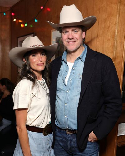 Nikki Reed in white top with delicate embroidery details