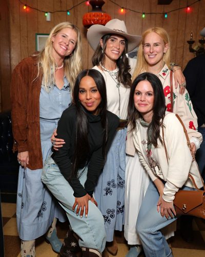 Nikki Reed in light blue embroidered skirt and white top