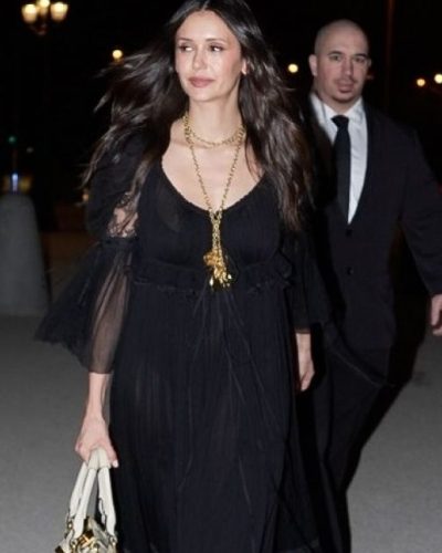 Nina Dobrev in black lace gown with billowing sleeves