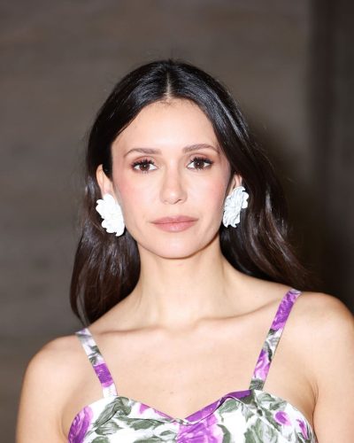 Nina Dobrev oversized sunglasses framing her face