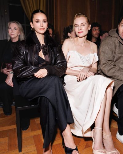 Nina Dobrev black leather jacket paired with tailored black trousers