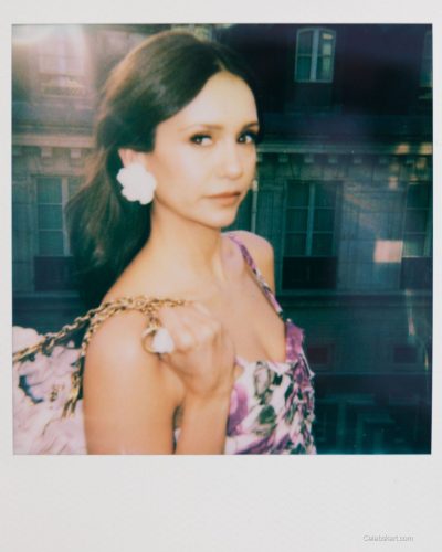 Nina Dobrev black dress with enchanting silhouette and elegant neckline