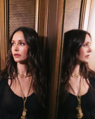 Nina Dobrev black dress with enchanting silhouette and elegant neckline