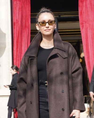 Nina Dobrev brown coat and fitted black top