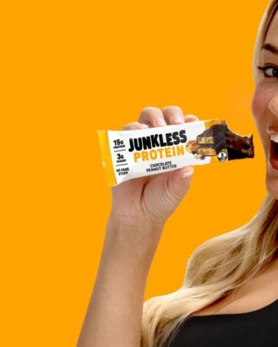 Olivia Dunne in a fashionable white robe with lively attitude