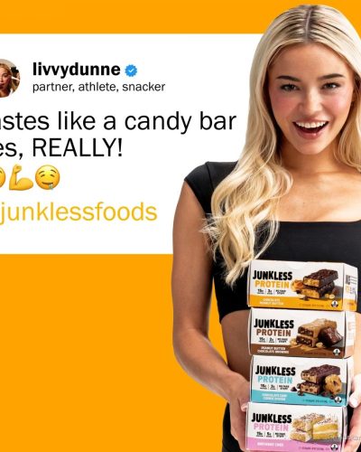 Olivia Dunne styled in a crisp white robe with glowing skin