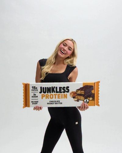 Olivia Dunne wearing black leggings and a stylish crop top.