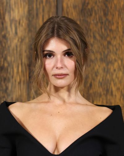 Olivia Jade in sleek black ensemble with long sleeves