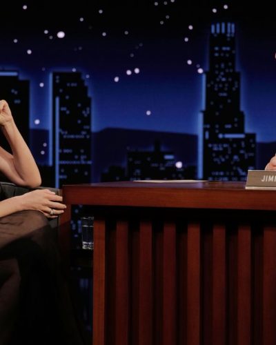 Olivia Munn in black feathered gown with sheer elements