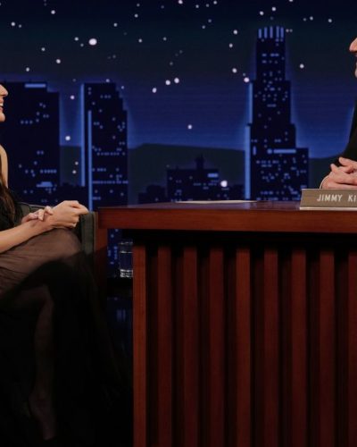 Olivia Munn wearing a black sheer gown with intricate details