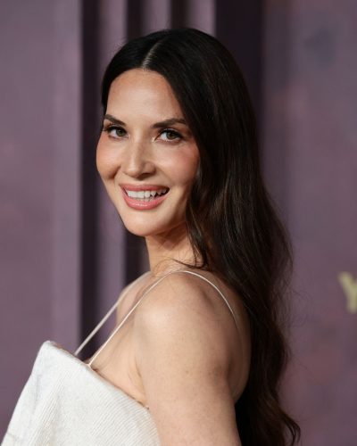 Olivia Munn in minimalist white dress with flowing fabric