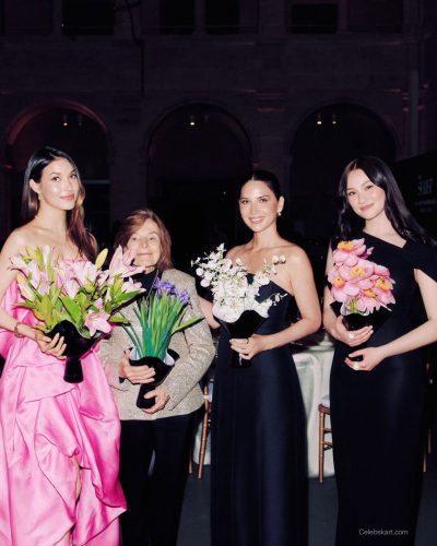 Olivia Munn structured black gown featuring decorative bow