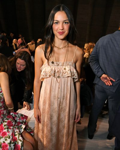 Olivia Rodrigo vibrant light pink dress with intricate detailing