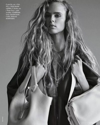 Olivia Vinten in fashionable brown jacket with mixed textures