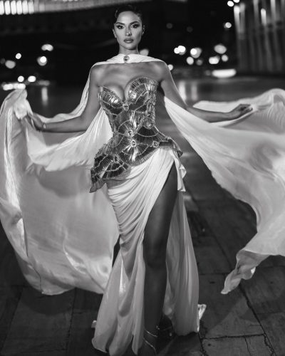 Oriola Marashi in sleek gown with delicate bracelet accessories