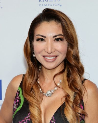 Panny Wei black gown with vibrant floral patterns