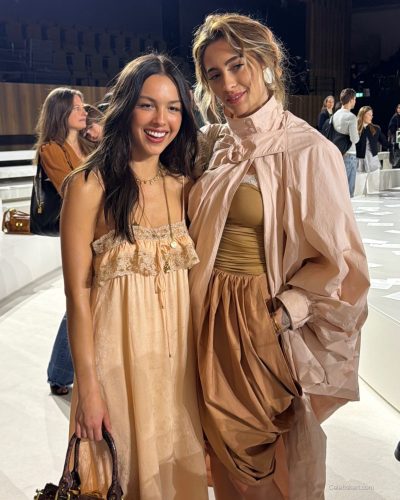 Paris Jackson in pink coat with billowy sleeves and nude heels