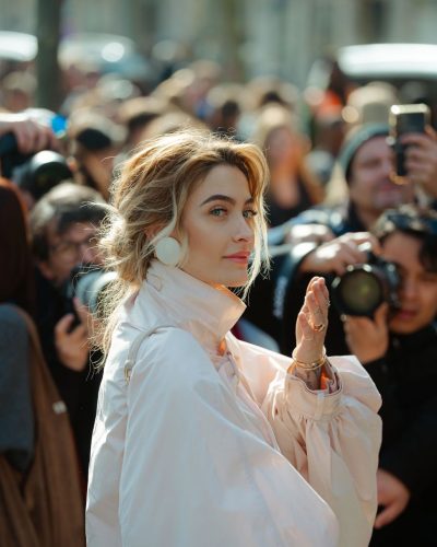 Paris Jackson gold top and pink draped jacket