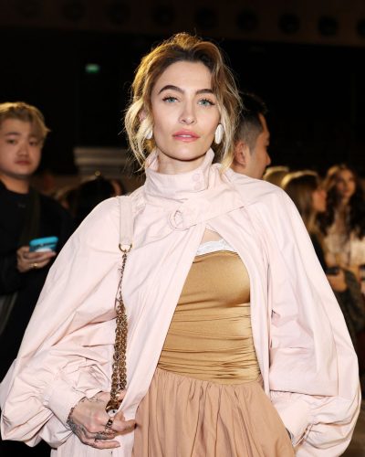 Paris Jackson fashion-forward pink jacket and clear heels