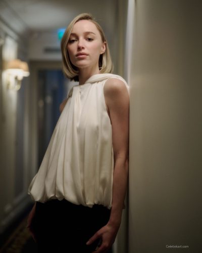 Phoebe Dynevor crisp white robe with minimal detailing