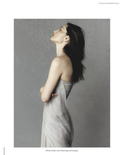 Phoebe Tonkin in a muted-toned gown catching the light