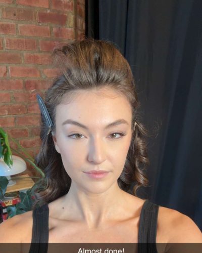 Rachel Pizzolato black tank top against vivid background