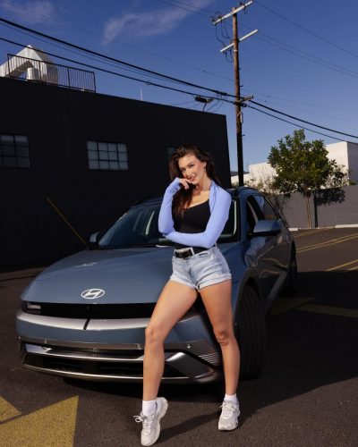 Rachel Pizzolato red fitted dress with scalloped neckline