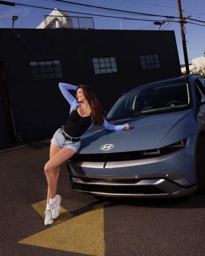 Rachel Pizzolato red dress with playful design details