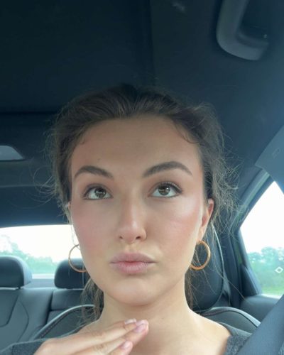 Rachel Pizzolato red dress with playful design details