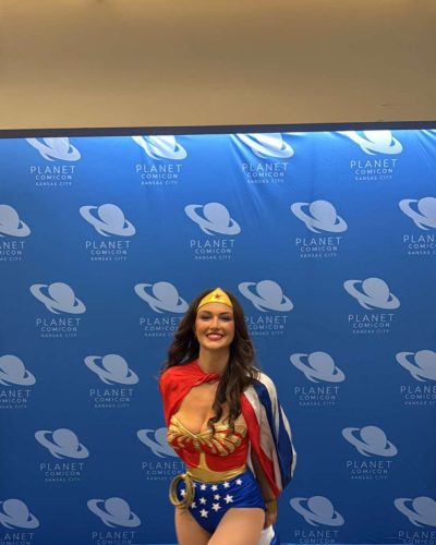 Rachel Pizzolato with a flowing cape featuring stars