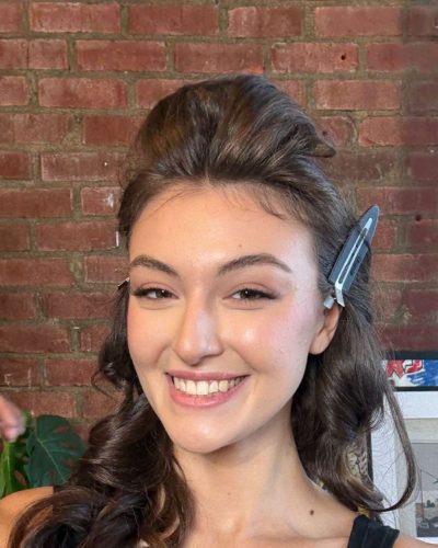 Rachel Pizzolato playful gray dress paired with knee-high black boots