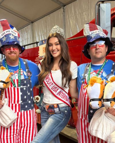 Rachel Pizzolato playful gray dress paired with knee-high black boots
