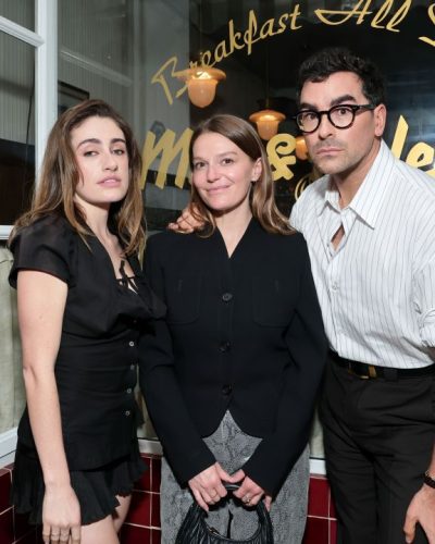 Rachel Sennott chic black dress with unique cutouts and details