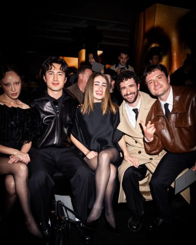 Rachel Sennott black dress complemented by sheer tights